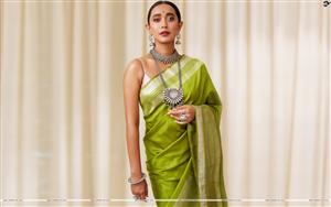 Gorgeous Sayani Gupta in strapped blouse and green silk saree, gracing with copper jewellery